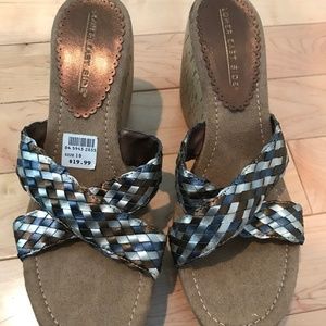 Size 10 upper east side. Brand new wedge sandals.